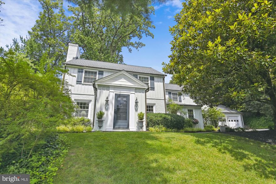 If you google the word “Happy”, the top result will be the pictures of this home.  7815 Overbrook is the epitome of a happy home.  From the vibrant colors to the open floor plan to the radiant gardens and grounds – this home is spectacular.  Lovingly maintained and updated, there are so many facets of this home that will make you fall in love.  The foyer welcomes one and all with a pop of pink and brightness.  There is a formal living room with a lovely wood burning fireplace.  A bright and cheery kitchen is the centerpiece of two wonderful spaces: flanked on one side by a sophisticated breakfast room and the other by a large yet cozy family room.  The office off the kitchen is nothing short of command central.  From files to supplies to all household items – if you dream of organization, this is the room for you.  A tucked away (yet not so far) dining room will delight all entertainers.  From the large glass window to the doors that open to a private patio, cocktails and dinner parties never felt so welcomed.  The second level is the perfect setup: four bedrooms and three full bathrooms.  The primary suite includes a wonderful sitting area with built-ins and closets and a separate full bathroom.  A lower level provides the must-have recreation room, along with another full bathroom, laundry room and extra storage space.  An over-sized two car garage accessible from an expanded driveway makes it easy to have multiple cars.  Last but not at all least – the grounds.  Beautifully landscaped and planted, every path and patio is bordered by greenery and color.  Bursts of hydrangeas, mature plantings and trees – there is as much color outside as there is inside!  The recently added pool is amazing.  Nestled in the upper section of the back yard, this salt water pool is a haven for summer relaxation and fun.  All of this and recently updated systems, roof, exterior painting and so much more.  Overbrook Road is one of Ruxton’s best kept secrets and 7815, the most idyllic of settings on this street, is your happy place waiting for you.