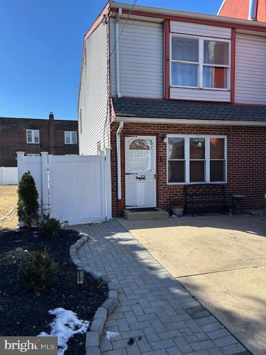 Welcome to this beautifully updated twin home in desirable Lawndale! This spacious property offers the perfect blend of modern amenities and classic charm, making it ideal for today’s buyer. Enjoy the convenience of two off-street parking spots—a rare bonus in this neighborhood. Step inside and immediately appreciate the open floor plan, flooded with natural light. The freshly painted living room features a cozy fireplace, a striking staircase, and a trendy wood slat accent wall, creating an atmosphere that's both stylish and welcoming. The living room seamlessly flows into the open kitchen and dining area, perfect for entertaining or relaxing with family. The kitchen is a true standout, showcasing a chic combination of white and blue cabinetry, luxurious quartz countertops, a subway tile backsplash, and sleek stainless steel appliances. Updated flooring throughout adds to the home's fresh, modern feel. Adjacent to the kitchen, you'll find a spacious utility room, offering ample storage space along with easy access to the home's mechanicals. The dining area opens to a private covered porch overlooking the backyard, offering a peaceful spot for outdoor meals. Step outside onto the large deck—ideal for summer grilling and outdoor gatherings. The backyard is fully fenced, perfect for pets or play, and includes a handy shed for additional storage. Upstairs, the main bedroom is a serene retreat, featuring custom-outfitted closets and an ensuite bath for added privacy and comfort. Two additional well-sized bedrooms are bright and airy, with plenty of closet space. The fully updated hall bath is both stylish and functional, offering all the modern features you expect. This home is located in a vibrant Northeast Philadelphia neighborhood, close to local shops, dining, and all the conveniences you need. With easy access to major roads, hospitals, shopping, and public transportation, this home truly offers it all. Don’t miss the opportunity to make this move-in-ready gem your own!