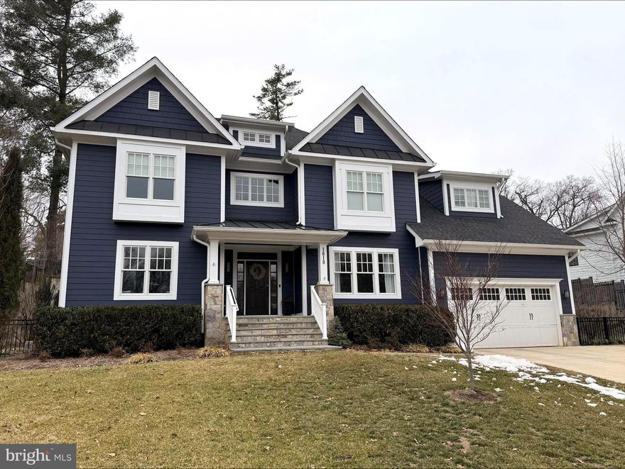 Custom built in 2019 by well known local builder, MR Custom Homes, this beautifully designed and move-in ready residence reflects a refined take on transitional craftsman design, where quality materials and intentional details take center stage. Ideally situated in the heart of Chesterbrook Woods—one of McLean’s most desirable neighborhoods and just one stoplight to Washington, DC—1610 Brookside Road offers 6 bedrooms, 6.5 bathrooms and over 6,000 finished square feet of thoughtfully scaled spaces  that feel both timeless and comfortably livable.

Inside, 9-foot ceilings, hardwood floors, and extensive millwork—including upgraded base, crown, and door moldings, custom built-ins, wainscoting, and coffered ceilings—create warmth, character, and cohesion throughout. 

The main level balances classic proportions with comfortable flow. Formal living and dining spaces are enhanced by detailed trim and built-ins, while the heart of the home—a well-appointed kitchen with custom maple cabinetry, quartz countertops, marble backsplash, oversized island with prep sink, and a premium appliance suite including Sub-Zero and Jenn-Air—opens seamlessly to the family room. A floor-to-ceiling tiled fireplace with built-in shelving provides a natural gathering place, making the space equally suited for everyday living or entertaining. 

A private office on this level also serves as a full bedroom suite, complete with its own full bath—offering exceptional flexibility. Whether used as a dedicated work-from-home space, guest quarters, or main-level bedroom for multigenerational living, this suite ensures comfort and privacy without compromise. 

Upstairs, the primary suite is a calming retreat featuring two expansive, custom walk-in closets with bespoke built-ins and exceptional storage. Just beyond, a windowed flex space with a built-in desk offers a rare and versatile extension—ideal as a private office, creative studio, or dedicated planning area.  The spa-inspired bathroom offers a soaking tub, frameless glass shower, and dual vanities with quality finishes. Each additional bedroom includes its own en suite bath, and the upper level laundry room adds convenience and organization to daily routines. 

The fully finished lower level expands the home’s flexibility with a spacious recreation room, game area, exercise room, additional bedroom and bathroom, and walk-up access to the backyard—ideal for guests, hobbies, or relaxed gatherings. 

The backyard is a thoughtfully designed outdoor living environment, offering three distinct spaces for entertaining and relaxation. The deck accommodates a full dining arrangement for elevated al fresco gatherings, while the covered porch—complete with built in Bromic ceiling heaters, a ceiling fan, recessed lighting and a mounted television—creates a seamless extension of the home for year-round enjoyment. A separate patio anchored by a firepit and built-in LED lighting and generous seating provides a more intimate setting for evening conversation. Beyond these curated spaces, the lawn offers ample room for recreation and play, delivering both sophistication and functionality.

Additional features include a two-car garage with EV charger, an extra driveway space for a third car, a two-zone HVAC system, energy-efficient construction, and a professionally landscaped 0.35-acre lot. 

Located just one stoplight from DC and minutes to parks, trails, shopping, and major commuter routes, 1610 Brookside Road offers timeless design, modern comfort, and an exceptional location in McLean.  Chesterbrook Elementary, Longfellow Middle, and McLean High School Pyramid.