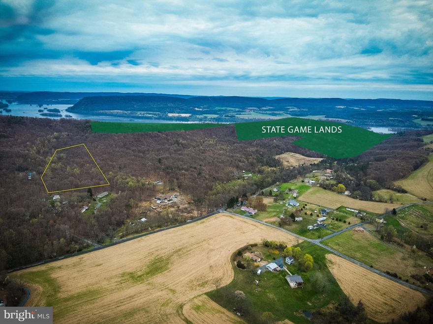 Tucked away in the heart of Perry County, this 7.14-acre parcel at 3 Sand Pit Ln offers the perfect blend of seclusion and outdoor adventure. Whether you're looking for a peaceful off-grid getaway or a future homesite, this property delivers on both.

A rustic cabin sits quietly among the trees—ideal for sheltering from the weather or spending weekends immersed in nature. While the cabin has an outhouse and basic structure, it's not factored into the asking price, allowing buyers to focus on the land’s true potential. Build your dream retreat, park your camper, or simply enjoy the existing setup.

A creek runs along the property line, adding to the tranquil setting, and signs of whitetail deer were throughout the property from deer trails, buck rubs, and tracks, painting the picture of a hunter’s haven. Just down the road, you’ll find State Game Lands 254, encompassing 1,162 acres of rolling forest and river islands along the Susquehanna River. This area is renowned for its quality in wildlife including deer, grouse, squirrel, and waterfowl, and offers ample opportunities for hunting, fishing, and hiking. Two public boat ramps are located less than 3 miles away allowing quick access to the areas best fishing along the Susquehanna River making this a prime location for year-round outdoor recreation.

Affordable, scenic, and ready for your vision—this is your opportunity to own a piece of Pennsylvania wilderness.

Buyers and their agents are encouraged to conduct their own due diligence regarding the property and its potential uses.