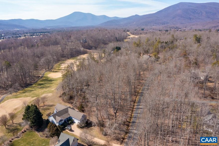 Nearly level parcel along the golf course (Tuckahoe 6)! Enjoy fairway and seasonal mountain views. Many extras that can reduce the cost of building your dream home - easy terrain, access to public water and sewer, AND fiber optic internet making streaming or working from home a breeze. Ideal for future full-time residence, second home getaway, or even an investment rental since short term rentals are permissible. Enjoy the many Wintergreen Resort amenities especially for strolls (ideal location for dog walking) to Allen Creek Nature Preserve, Lake Monocan, farmers market and more. As a property owner have access to the Rodes Farm pool, tennis, covered pavilion, play area (as shown in pictures) and don?t forget the various ponds to include the stocked trout pond. About one mile to Route 151 and the wine and brew trail, Nellysford town hub, and unlimited outdoor recreation opportunities like hiking and skiing.  Only 30 minutes to Charlottesville.