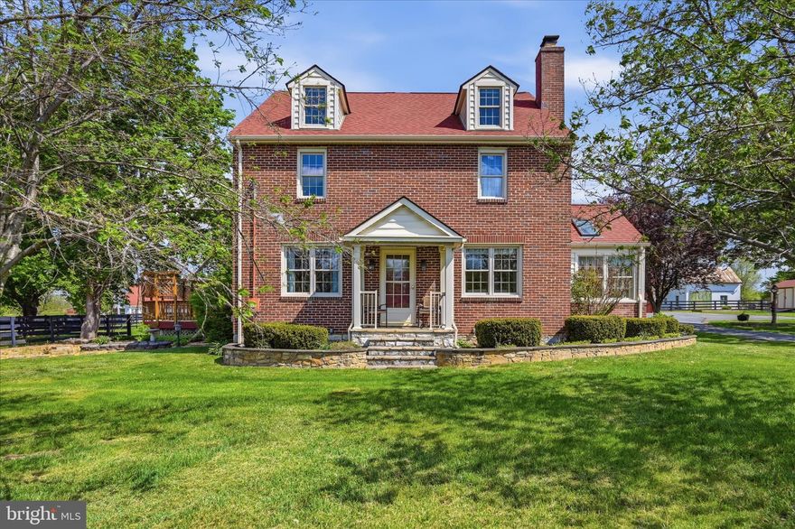 This one truly has it all-blending old-school charm with tasteful modern upgrades.  No stone has been left unturned in this beautifully maintained 1900's craftsman home.  The semi-open main level features a gourmet kitchen with stainless steel appliances and gas cooking, along with formal living and dining spaces, an eat-in kitchen area, and a sun porch filled with natural light from skylights.  Hardwood floors and crown molding run throughout most of the home.  The upper level offers four bedrooms and two full baths.  The spacious primary suite includes walk-in closets and spa-like bath with double vanity, jetted tub, and separate walk-in shower.  BONUS?? Of course! Third level bonus space complete with full bath, open living and includes pool table.  Perfect for game room, teenage suite or workout space.  Unfinished basement for added storage and built-in shelving.  Step outside to your private oasis with extensive landscaping, mature trees for shade, and a semi wrap around porch leading to an extra large deck for ideal entertaining.  Additional features include a detached garage with 100-amp electric and natural gas hook-up availability,  oversized garden shed and a fully fenced pasture ideal for animals or hobby farming.  The paved driveway offers dual access points-one from route 7 and another entrance on Russell Road for added safety and convenience.  Roof 7 years young and upgraded siding.  Located just off route 7 making this ideal for commuters.