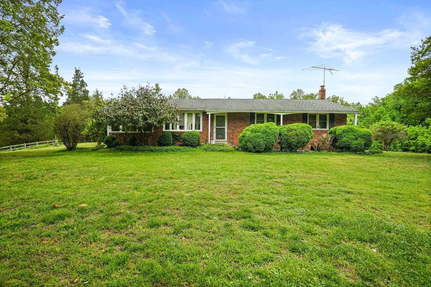 Private and secluded rancher situated on a beautiful 4.54 total acres, which includes two adjacent lots: Tax ID 17151780089 and Tax ID 17151780105. This well-maintained all brick 3 bedroom, 2 full bath home offers a great opportunity for a buyer to add their own updates and personal touch.

The main level features an open living with large bay window and dining room with hardwood flooring throughout, a spacious sunroom off the side of the home, and a kitchen with plenty of room for cooking and an eat-in table. The home also includes three generously sized bedrooms, a hall bath, and a primary bedroom with ensuite bath. The sunroom opens to the lush backyard and is the ideal spot for relaxing, nature watching and gathering with family and friends. 

The  expansive unfinished walk-up basement offers excellent potential for additional living space and includes the laundry area and with stairs leading to the backyard. Major updates include furnace replaced in 2016, heat pump in 2015, and roof in 2009. Home also includes a water softener. Property is being sold as-is. All this located in a tranquil setting that makes you feel miles away from the hustle and bustle yet is so close to major routes, shopping, dining and entertainment options.