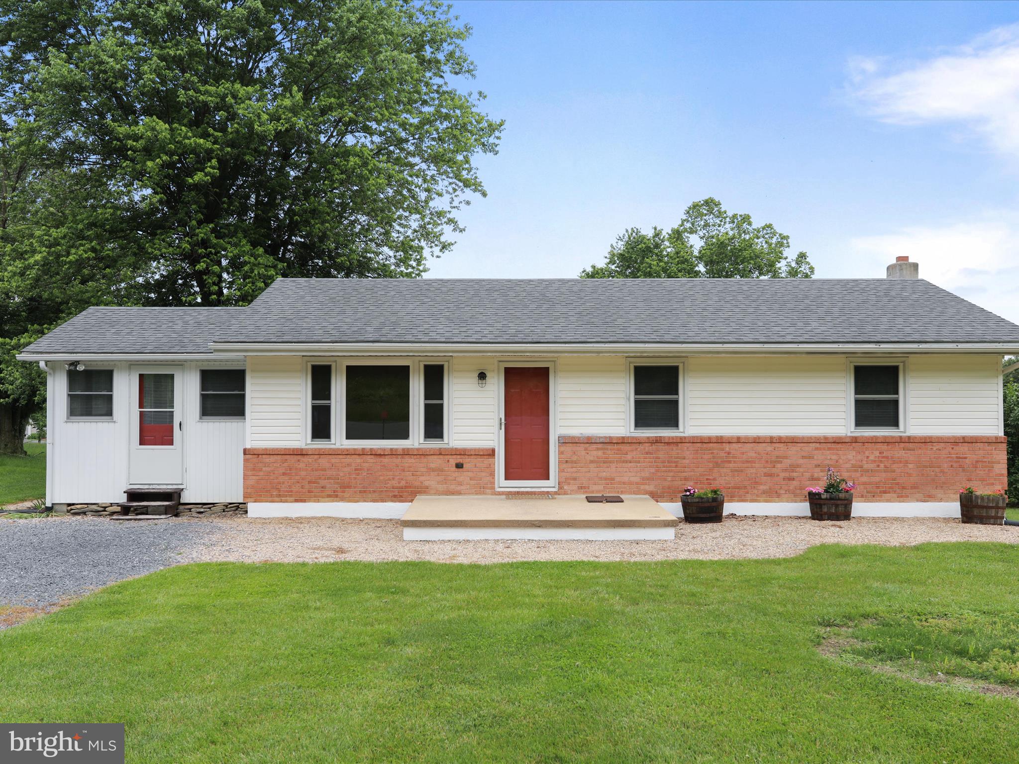 Charming One-Level Living Just Outside New Market!
This well-maintained 3-bedroom, 2-bath home is perfectly situated on nearly half an acre (.46 acres) and offers comfortable living both inside and out. Step into a spacious living room with gleaming hardwood floors and a large picture window that fills the space with natural light. The kitchen features durable grouted vinyl tile and flows into a cozy sunroom—ideal as a mudroom or flex space. The family room, also with hardwood flooring, opens to an expansive back deck overlooking a level backyard, perfect for outdoor enjoyment. Two bedrooms boast hardwood floors, while the generously sized primary suite includes a soaking tub, dual vanity, and more hardwood flooring. A finished walk-out basement with 8-foot ceilings adds valuable living and storage space. Enjoy the peace of country-style living with the convenience of being just minutes from town.