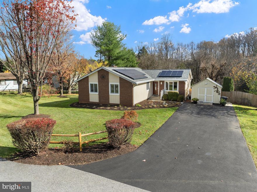 OPEN HOUSE CANCELLED! Conveniently located to shops, restaurants and major commuter routes, this Ranch style home is LOADED WITH UPDATES both inside and out.  With its charming curb appeal, you will have peace of mind knowing that that your energy saving "leased" solar panels, roof, gutters, windows, soffit and siding, not to mention your HVAC system, hot water heater, washer, dryer, dish washer and pool pump, have ALL been UPDATED in the LAST 5 YEARS OR LESS. A home fit for entertaining family and friends, enjoy the privacy of your fully-fenced rear yard, with its beautiful fresh water in-ground pool and sizable no-maintenance deck (2023). Enter this FRESHLY PAINTED home to find the convenience of one level living, with the perk of also having a nearly fully finished lower level, with tons of storage, additional multi-purpose living spaces, a full bathroom, and walk-out slider to the rear yard. The main level offers 3 bedrooms, including a primary ensuite and NEWLY RENOVATED secondary bathroom (2024), beautiful LVP flooring, recess lighting and decorative molding.  Enjoy your gourmet kitchen, with "chef worthy" features, including a 6-burner gas range, pot filler, double oven, copper sink, granite countertops, stainless appliances and large built-in pantry. Cozy up in front of your wood burning fireplace and enjoy all that this home has to offer. DON'T MISS THIS ONE, IT WILL NOT LAST!