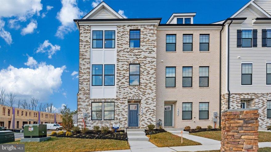 INTERIOR UNIT, IMMEDIATE DELIVERY!  This 3-story open and contemporary floorplan that encompasses 4 bedrooms, 3.5 baths, and a 2-car rear load garage is STUNNING, and ready for a new homeowner this winter. Thoughtful design and modern luxury are uniquely embodied in this townhome plan, which features 1,763 sq ft of living space. It offers a spacious main level eat-in kitchen with white cabinets, recessed lighting, and a generous island providing plenty of cooking and entertaining space. The upper level boasts a private laundry closet and stylish primary bedroom, complete with a walk-in closet and dual vanities. The lower level features a finished 4th bedroom as well as a full bath. Hard surface flooring throughout the entire home offer modern luxury and contemporary appeal.  With black window trim and a black garage, the curb appeal of this home boasts an urban and modern feel that is sure to stand out.  This specific home also boasts clear sight lines directly in front and behind the home, providing an excellent view free of obstructions.  Location within the community is also IDEAL with multiple guest parking spaces directly behind the home, and easy access to main roads leading in and out of the community.  Conveniently located across the street from tons of shopping and entertainment options. Incredible rates and closing incentive options available with the use of DHI Mortgage.