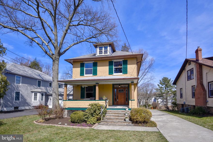 Sun drenched and ready to move in, this fantastic 5 bedroom 2 and a half bath home has been completely upgraded from top to bottom.  Eat-in kitchen with updated SS appliances and two dishwashers - great for entertaining, mud room with built-ins, renovated bath, beautiful wood floors, 9 foot ceilings through out first floor and original mouldings.  With a large yard, mature trees and landscaping, and a full-length covered front porch you'll want to call this home!