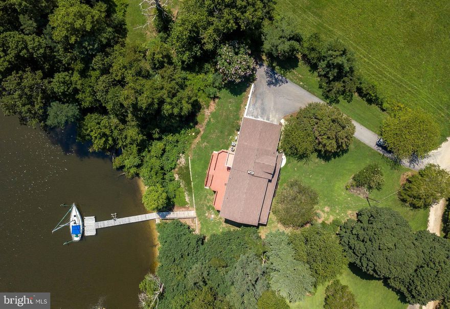 Hollywood Waterfront on Cuckold Creek.  Deep sailboat water.  Colonial on a full finished walk out basement. Wonderful creek views from all 3 floors. 4 bedrooms  with a bedroom and full bath on the main level. 2 fireplaces, hardwood floors, huge deck, woodstove, office off the master, walk in closets and much more.  3 car garage and a pier.