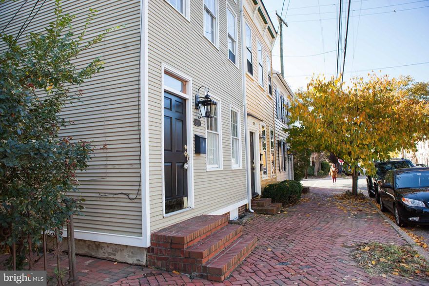 This freshly renovated one-bedroom unit offers the quintessential Old Town experience! Its central location allows the tenant to be just steps away from neighborhood amenities, dozens of restaurants, great shopping, and public transportation. The interior of this historic charmer has been completely modernized with a brand-new kitchen featuring quartz counter tops and stainless appliances. Fresh paint brightens the entire space and compliments the warm hardwood flooring throughout.  Vaulted ceilings in the bedroom exposed the original beams.  This unit also features a private brick patio perfect for outdoor dinning, entertaining, or lounging in the Alexandria summer.  Welcome Home!