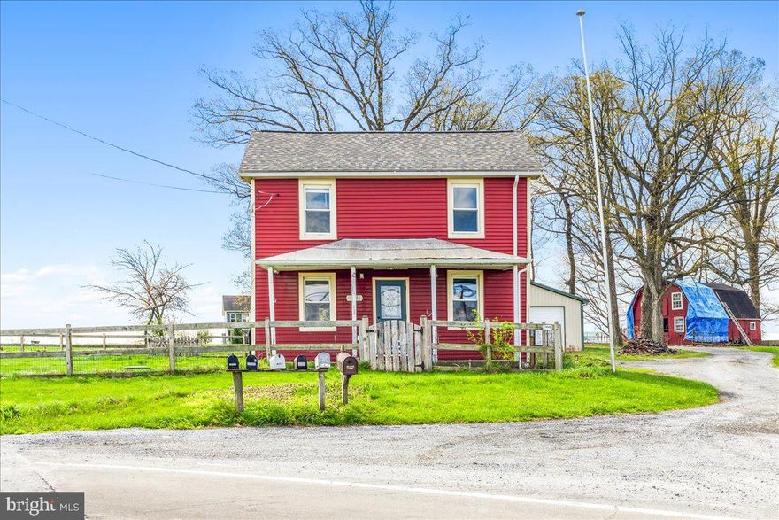 Very Charming Historic home on 1.02 acres in an amazing Frederick County location! Beautiful rural views in every direction. Less than 5 years ago the siding, roof, windows and baseboard heaters were replaced. Approximately 8 years ago the kitchen cabinets,  countertops, and appliances were replaced. The pellet stove in the cellar was also replaced about 8 years ago. There is a full attic with stairs for ample storage. The basement beams and joists were replaced by an experienced licensed builder/ contractor less than 5 years ago. Exterior amenities include partially  fenced in yard around the home, lots of driveway parking and a Pole barn/ Oversized detached garage with a car lift  that is 30' by 30.