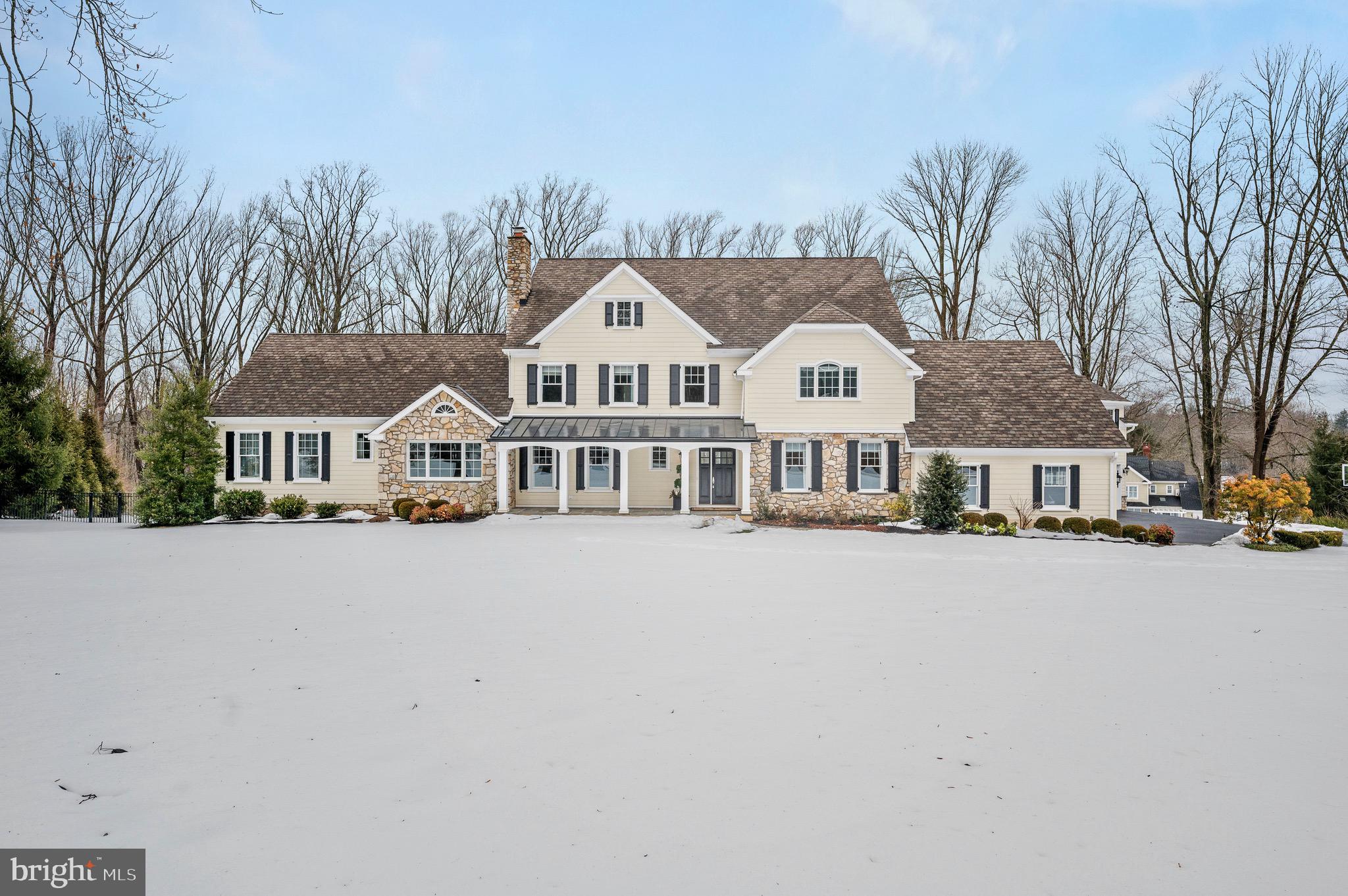 Welcome home to 1115 Signal Hill Lane! Prepare to be wowed by this 5 bedroom, 4.3 bathroom home in the highly desirable Leopard Lakes community and Tredyffrin-Easttown School District! Enter the warm and inviting two-story foyer with grand staircase and appreciate the open floor plan that flows easily for everyday living and entertaining. Magnificent features include exquisite custom millwork, crown molding, deep baseboards, coffered and tray ceilings, recessed lighting, three fireplaces with an additional fireplace outside, first floor guest suite with luxury bathroom, two car detached garage with finish ready space above, and so much more - no detail has been overlooked! This home features a gorgeous and bright formal dining room with an adjacent butler's pantry offering a wine fridge, beverage fridge, and beer tap. The gourmet kitchen which opens to the family room and light-filled breakfast area is the heart of the home with custom inset cabinetry, classic farm sink, stainless steel commercial grade appliances, massive island with bar sink, quartzite countertops and subway and marble tile backsplash. You'll love the breakfast area with wall of windows, vaulted ceiling and built-in banquette seating. The family room with coffered ceiling, french doors to the expansive deck, and gas fireplace will be your family's favorite place to gather. Extending beyond here is a fabulous gathering space with seating area and access to the spacious screened porch with gas fireplace, a large play room, and a first floor ensuite bedroom with full bath - perfect for guests! Travel down the hall to a formal powder room and private living room with wood burning fireplace. Completing the first level of this home is a command center with built-in desk and cabinetry, stylish powder room, and step down to a mudroom with built-in cubbies and access to the garage. On the second level, the spacious master suite is sure to please with walk-in closet with built-in cabinetry, separate sitting area with adjacent laundry area, and a luxurious spa like bathroom with jacuzzi tub, enlarged spa shower, dual marble vanity, separate toilet and linen closet. There are three additional generously sized bedrooms on this floor, one ensuite and the other two sharing a jack and jill bathroom. Finished above the garage, you will love the huge movie/media room with screen and projector. Adjacent to this is an additional space for a laundry room with sink and lots of storage. The finished lower level of this home is not to be missed - expansive and ready to be whatever you can imagine - game room, hangout area, study space, home office - plus there is a powder room and professional style gym. The indoor-outdoor living of this home is great for entertaining with a screened in porch with built-in gas fireplace that leads out to a very large deck with retractable awning and hot tub. A flagstone patio and fire pit completed in 2016 makes this outdoor oasis a dream come true! All of this plus a whole house generator, security system, interior and exterior Sonos, environmentally friendly, Geothermal Heating, huge fenced in rear, flat yard, and partially finished area above detached garage- perfect for additional living space. This incredible community invites a casual while active lifestyle by the lake with year-round activities and traditions such as kayaking, swimming, ice skating, tennis, and the carriage parade during The Devon Horse Show. This property has it all and will not last, make your appointment today!