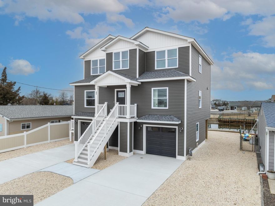 Welcome to 42 W Mohawk Dr, a stunning newly built 4-bedroom, 3-bathroom waterfront home in the sought-after Osborn Island community. This beautifully designed 2,200sq. ft. home offers the perfect blend of luxury, comfort, and coastal charm.
Step inside to find hardwood flooring throughout the main and second levels, a bright and open-concept living space, and a modern kitchen featuring sleek white cabinetry, stainless steel appliances, and a stylish island—perfect for entertaining. Cozy up by the fireplace in the living room or step outside to enjoy breathtaking lagoon views from your private 10x20 deck.
The spacious primary suite boasts a luxurious en-suite bath with an elegantly designed shower, while the thoughtfully placed laundry area near the main entrance keeps late-night noise to a minimum.
Outside, your private dock provides direct access to the lagoon, making it easy to enjoy boating, fishing, kayaking, and more. With 50 feet of waterfront frontage, this property is ideal for water enthusiasts looking for an everyday escape.
Osborn Island is an excellent place to live and invest, offering a peaceful coastal lifestyle with easy access to top attractions. Located just 30 minutes from Long Beach Island (LBI) and 40 minutes from Atlantic City, you’ll have endless opportunities to enjoy beaches, shopping, dining, and entertainment.
Whether you're looking for a vacation home, investment property, or forever home, this turnkey waterfront retreat is ready for you! Don't miss this incredible opportunity—schedule your showing today!