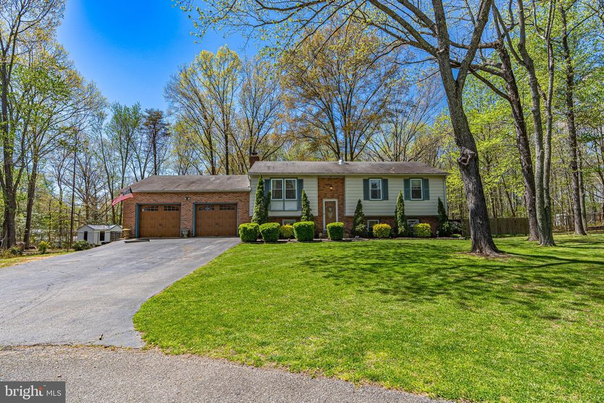 Split foyer on a quiet cul de sac situated on little over an acre of land. This house has attached two car garage for parking. Two tier deck off the kitchen overlooking the backyard pool perfect for entertaining. Fenced in remainder of the yard allows privacy for you and your pets. Large storage shed. Second storage shed for yard storage. Entryway has been updated. New floors upstairs, newer appliances.  Finished basement, large laundry  room, bedroom and bathroom, rec room leads to  sliding door exit onto outdoor patio. Close to town of LaPlata. Seller is going to have pool open for season. House being completely power washed. Professional cleaning service hired for move out.