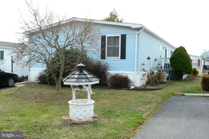 Rare 4-bedroom find! This spacious, double-wide mobile home offers plenty of room to spread out and enjoy. Recent upgrades include a newer dishwasher, garbage disposal, dryer, fresh paint, and added shelving throughout. Nearly all flooring has been updated, with just one bedroom remaining. The home is well-maintained and move-in ready, featuring relaxing front and rear decks—perfect for unwinding or entertaining.

Enjoy the community amenities, including a clubhouse, swimming pool, fitness center, playground, and basketball court—offering the ideal combination of easy living and an active lifestyle.