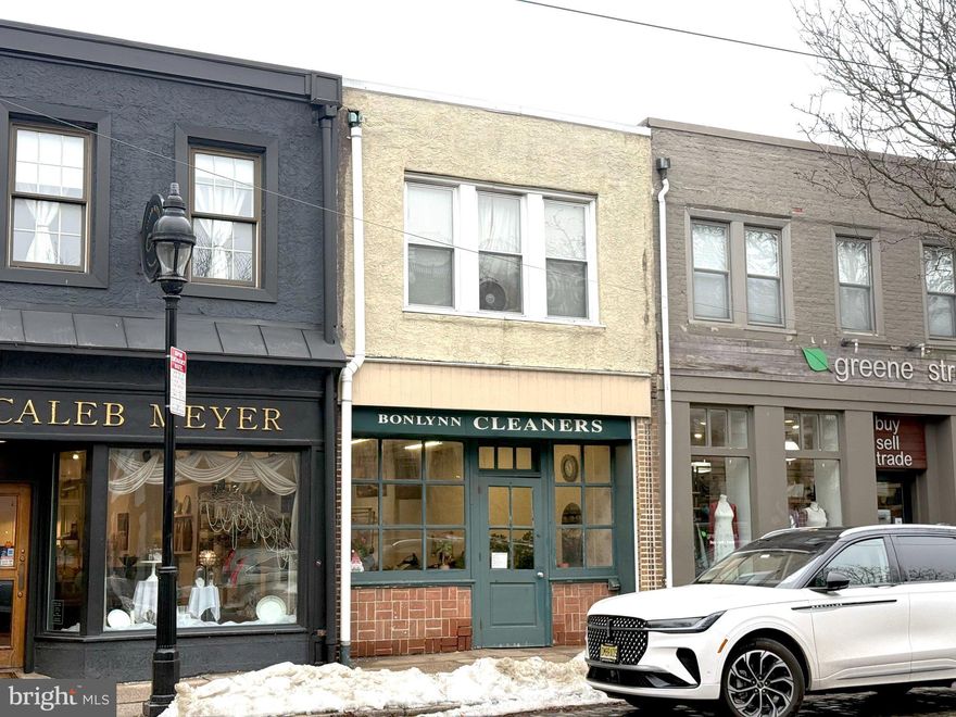 Mixed-use property located in the heart of Chestnut Hill, Philadelphia, featuring a street-level commercial space currently operating as a drop-off dry cleaning business and a spacious second-floor 2-bedroom apartment. The commercial unit benefits from excellent visibility and strong neighborhood foot traffic along one of Chestnut Hill’s vibrant retail corridors, while the residential unit offers a comfortable layout and separation from the business below. This property is situated in one of Philadelphia’s most desirable, walkable communities - known for its tree-lined streets, boutique shopping, acclaimed restaurants, historic architecture, and easy access to regional rail, parks, and cultural attractions. Ideal for an investor or owner-occupant seeking income potential in a thriving, transit-friendly neighborhood.