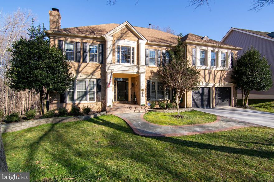 Stunning custom Rothschild model  5BR/4.5BA (close to 7000 sq feet of living space) in coveted neighborhood of Barrington. Gracious open marble  floor 2 story foyer welcomes you to this one of a kind estate home.  1st floor private home office with glass FR doors & gas FP. LR with floor to ceiling windows  and gas FP. Two story great room with wall of windows overlooking treed common area. Custom wet bar in great room is perfect for entertaining small or  large groups, 3rd gas fireplace. Don't miss the designer lighting  & Sonos sound system throughout. Chefs kitchen with high end cabinets, ss cooktop/stove/wall oven, granite counters, huge island and pantry. Breakfast room with French door to private two level trec deck with stairs down to vast yard. Butler Pantry with sink, designer lighting beverage refrigerator in hall to separate formal DR. Oversized 2 car garge off kitchen in mudroom.

Focal point stair case to second level with sweeping views of foyer and grand room. Huge primary bedroom with sitting area/ gas fireplace. 4th bedroom upstairs has been transformed into designer walk in closet with custom shelves/draws, large island, designer lighting. Primary spa bath with heated marble floors, glass shower with multiple shower heads, separate  frosted glass commode room, dual vanities, large free standing soaking tub. 2nd bedroom with full bath ensuite (heated ceramic tile floors), nice sized 3rd BR.

LL is walk out  french doors to patio and outdoor storage. Huge recreation room with WBFP, wet bar. 4th large BR and full bath. 2nd office/den/exercise room.  Storage room/laundry room. Whole house is Sonos Wired with speakers.

Exterior has 3 side brick, on quite cul-de-sac.  Back yard overlooks treed common area. Multiple walking trails in neighborhood (Lake Mercer/Burke Lake/south Run Rec Center. Enjoy Barrington Pool and family friendly activities. Just minutes to Springfield-Franconia Metro/I-95/Ft. Belvoir/Pentagon/Quantico/MARC train.