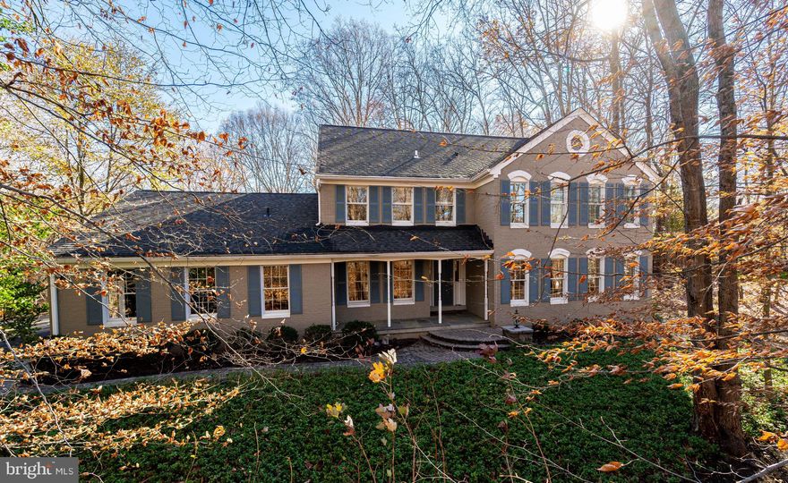 This expanded Colonial is perfectly situated on two serene acres in the desirable Mazza
Woods neighborhood, offering a tranquil retreat with convenient access to Washington,
DC, and Northern Virginia. Boasting approximately 4,000 square feet of finished living
space, this home features four generously sized bedrooms, three full baths, and one
half bath. The light-filled interior includes spacious living areas designed for both
relaxation and entertaining, complemented by a cozy fireplace that anchors the inviting,
family room.
The modern kitchen serves as the heart of the home, seamlessly flowing into the main
living spaces for effortless functionality. The primary suite offers a private escape with a
spa-like en-suite bath and ample closet space. The potential for additional living space in the
unfinished lower level can provide versatility for a recreation room, home office, full bath, 
or gym if the new owner desires more living space. The third garage bay has been
converted to a spacious, light-filled studio with laundry and mudroom. A welcoming
patio with ample room for outdoor dining and entertaining overlooks a beautifully
landscaped property with mature trees completing this charming property.
Located in a peaceful yet well-connected Mazza Woods community, this home offers
easy access to top-rated schools, shopping, dining, and major commuter routes, making
it the perfect blend of suburban tranquility and urban convenience.