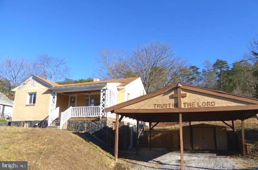 Call now  to see this 2 bedroom, living room, kitchen , 1 bathroom, basement and shed/carport on a half acre lot . This home needs some tlc but would possibly make a good rental, air bnb or personal residence. Located on a knoll, there are mountain views you can see on the front porch.  Just a few miles away there is shopping, dining ,etc in the city of Cumberland Maryland.  Make the move now to wild wonderful West Virginia and become a Mountaineer.