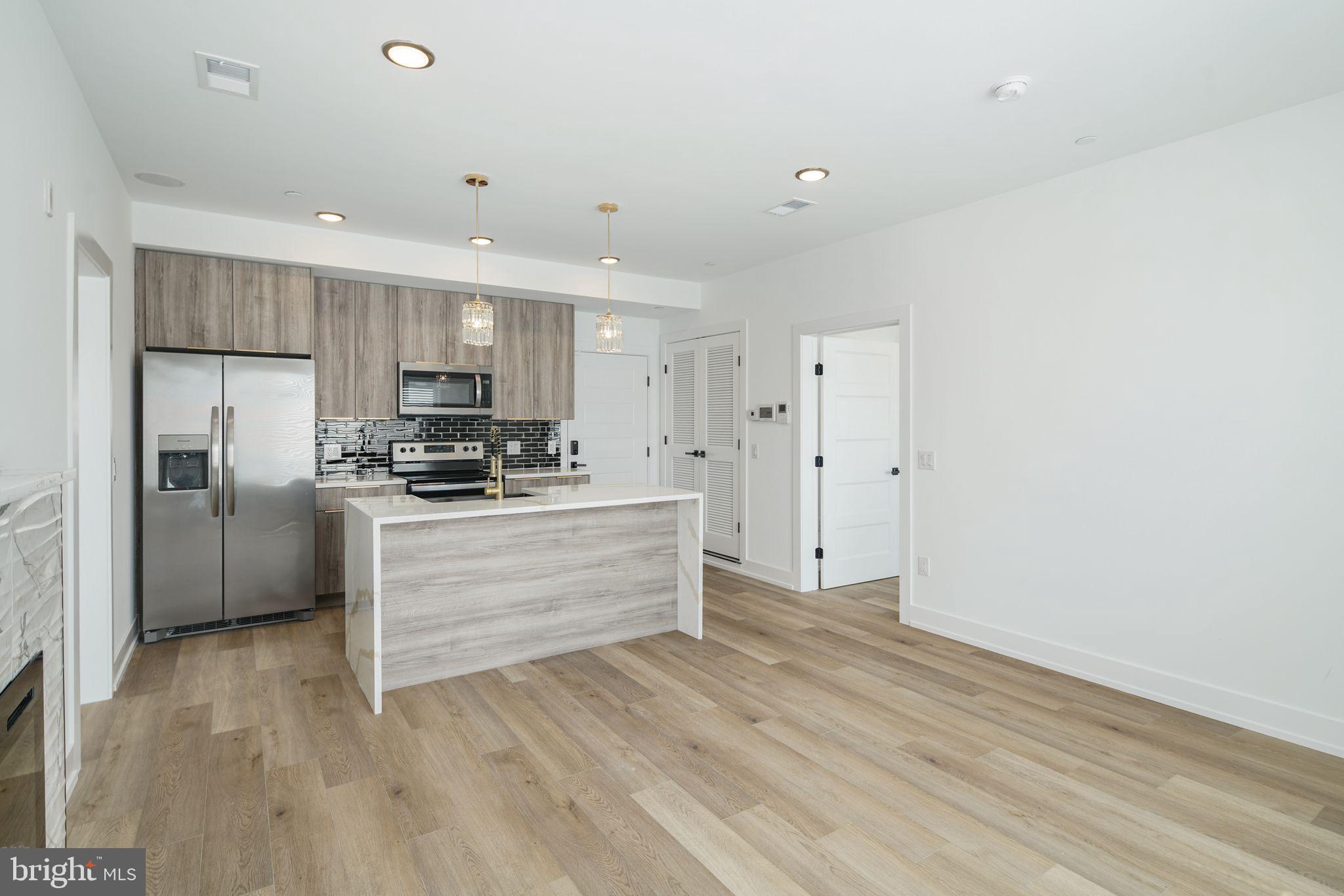 Welcome to 2000 N Front St , a brand new construction apartment complex with exceptional build quality. This includes calcutta quartz countertops, stainless steel appliances & sinks, soft close cabinets, electric fireplace & spacious custom closets, floor to ceiling tile bathrooms with LED mirrors. In addition, there are modern upgrades such as an alarm/intercom system, built in speakers, keyless entry/door codes, an in-unit stackable washer/dryer.. There is an elevator for convenience that takes you to each of the 4 residential floors, a basement that provides storage for your bike and a massive shared roof deck!
This apartment complex is in close proximity to major roadways, public transport & is a stones throw away from some of the best restaurants in Fishtown (LMNO & Kalaya).
GROSS RENT IS $1750, 1 MO FREE ON A 12 MO LEASE. AVERAGE PAYMENT IS $1605/MO OVER THE 12 MO LEASE.
Tenants are responsible for the following utilities:
Water $50/mo flat fee (subject to change)
Electric (based on usage)
Internet