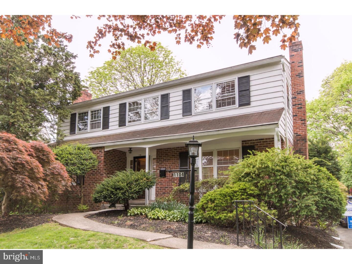 Welcome to 1104 Melrose Avenue... a truly move-in condition, beautiful house nestled in a highly desirable location in Elkins Park! The Center Foyer welcomes you with exposed hardwood flooring, and lots of natural light! The Formal Living Room features a wall of gorgeous built-ins that frame the brick surround wood-burning fireplace, with large windows and recessed lighting. The pretty Formal Dining Room is spacious and bright. The Eat-In Kitchen has granite counters, ample counter and cabinet space, gas cook top, double ovens, dishwasher, built in microwave, recessed lighting and a large eating area. Walk right out to the rear deck via sliding doors, and enjoy the beautiful views of the yard. The Family Room has a second stone fireplace that is also wood burning, and large windows. An updated Powder Room completes the first floor layout.  The spacious Master Bedroom has beautiful exposed wood beams, and shutters on the windows that add the perfect touch of detail. The Master Bathroom has a spectacular marble double sink vanity, sconces, and shower/tub. A large walk-in closet and ceiling fan make this Master Bedroom space everything you could hope for. There are 3 additional bedrooms on the second floor, each with ceiling fans, large closets, & lots of natural light. The Hall Bathroom has a beautiful stone vanity, pretty tile and a shower/tub. The  hallway allows access to the attic via pull down stairs. But wait...there's more!  The unfinished basement is the perfect space for additional storage, and could be finished into additional living space.  The fenced in back yard provides incredible outdoor space is perfect for relaxing, complete with large rear deck that allows for plenty of room to host your next dinner party. Gorgeous trees & shrubs create the perfect backdrop for summer fun. Detached 2 car garage. Central Air. Laundry is found in the first floor Kitchen area. Located in the heart of Elkins Park in easy walking distance to the Elkins Park Train Station, Creekside Co-Op, and all of the restaurants & shops in the downtown Elkins Park area. Truly move-in condition - schedule your appointment today!