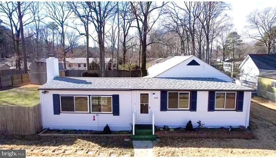 Lovely  well  maintained 1400 sq ft rancher with large family room and fireplace.  Large level lot with rustic 2 story barn with electric for extra storage. Ample off street parking, fenced yard  and located 2 blocks from the Chesapeake Bay and Herrington Harbour. See the bay every day!