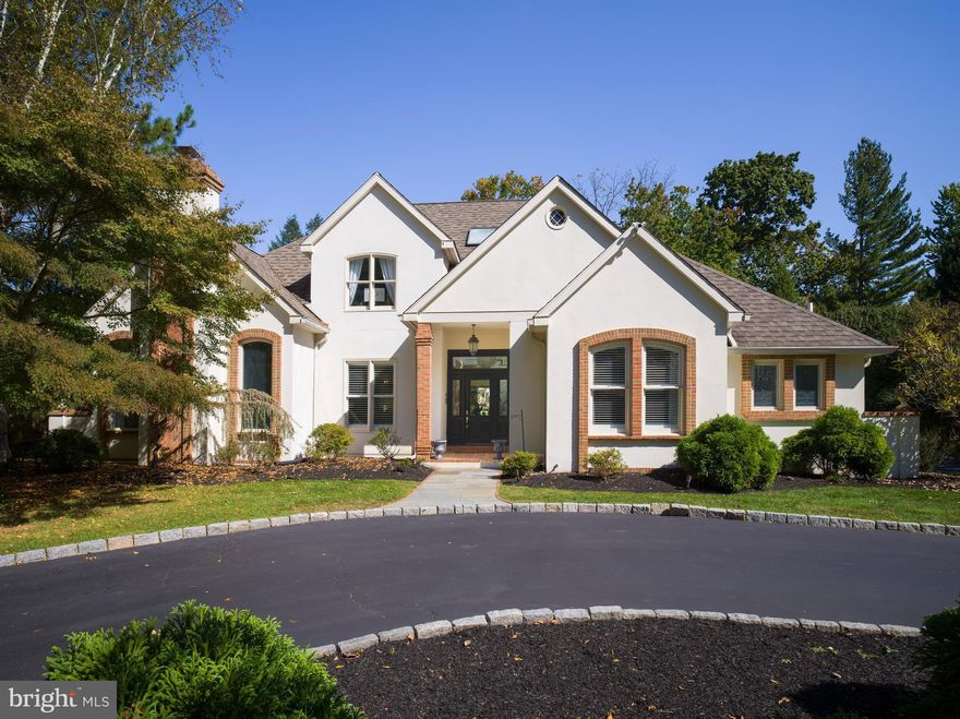 Welcome to this stunning newly renovated Bryn Mawr home, now featuring a large, level rear yard oasis created by the extensive removal of trees and shrubs—perfect for recreation or outdoor entertaining. Positioned well back from the road, the home offers natural screening and gorgeous landscaping, providing privacy and tranquility. Situated on a quiet section of Old Gulph Rd at the gateway to Hoffman and Victor Drive, this 4-bedroom, 3.5-bathroom residence offers 3,200 square feet of luxurious living space.

As you arrive, a circular driveway and ample parking create a welcoming entry. Inside, the drop-dead interior design is current and completely on-trend. A spacious front center hall leads to an elegant dining room and a living room with a gas fireplace. Two sets of French doors open to the oversized family room, where you’ll find a built-in entertainment center, an extra-large ceiling fan, a marble gas fireplace, and soaring cathedral ceilings. The newer white gourmet kitchen features top-of-the-line appliances, including a Subzero refrigerator, Wolf range and hood, and beautiful quartzite countertops. The kitchen flows into a circular breakfast nook, offering five windows that frame picturesque views of the outdoor patio oasis and rear grounds. A navy blue striped awning provides shaded outdoor comfort, making this 0.71-acre property ideal for enjoying the secluded backyard.

A highlight of this home is the first-floor primary bedroom suite, which boasts dramatic cathedral ceilings, twin overhead bedside pendant lights, and custom trim work throughout. The luxurious bathroom suite includes marble countertops on dual vanities, a soaking tub, and a walk-in shower with marble accents. Also located on the first floor is a second bedroom with its own private full bath featuring a tiled tub/shower combination.

Upstairs, you’ll find two additional bedrooms connected by a completely renovated Jack-and-Jill bathroom. There is also a large unfinished attic space offering potential for additional living space or extra storage.

This exceptional home is within walking distance to the R5 train, top-rated schools, upscale shopping, dining, and the charming Airdale Park. Turnkey is truly an understatement for this exquisite property—schedule your private tour today and make this Bryn Mawr gem your own!