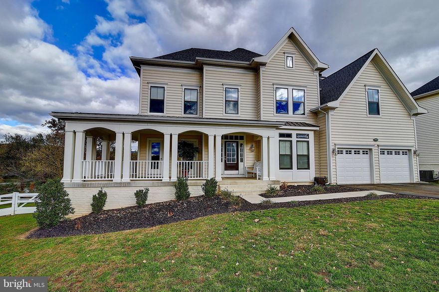 Lake Views form every window ! Beautiful Shenandoah Model 2 yr new ,  spacious floor plan that includes a first floor library and 2nd floor laundry room,  luxurious master bedroom, complete with sitting room, Upgrades include:  Bdrm ceiling fans * Custom moldings,paint, plantations shutters 5" Hrdwds throughout  * Fully fenced yard * 20x8 shed on concrete base with power and lights!  Must See !...