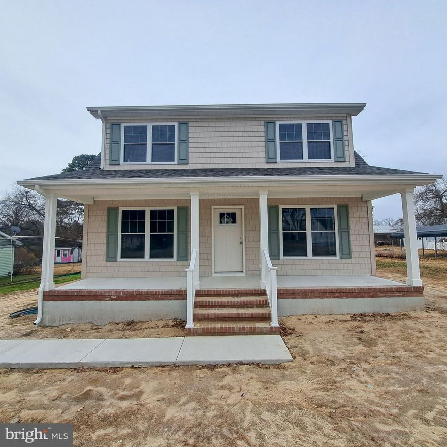 Welcome to this beautifully crafted two-story Cape Cod home offering 4 bedrooms and 2.5 bathrooms with thoughtfully designed living spaces throughout. The first floor features an open-concept living and dining area, perfect for everyday living and entertaining. The kitchen seamlessly flows into the main living space and is appointed with stainless steel appliances and elegant quartz countertops. A convenient half bath with quartz countertops, along with a dedicated laundry/mudroom, adds to the home’s functional layout.
The primary bedroom is located on the first floor and includes spacious walk-in closets and a private en-suite bathroom featuring a quartz-topped vanity and a walk-in tiled shower.
The second floor offers a large family room with vaulted ceilings and a built-in electric fireplace, creating a warm and inviting retreat. Three generously sized bedrooms, each with walk-in closets, and a full bathroom with a shower/tub combination and quartz countertops complete the upper level.
Additional highlights throughout the home include oak tread stairs, a welcoming front porch with brick row lock detailing and brick steps, as well as a back stoop and side stoop for added convenience.

This home is currently under construction and additional photos will be upload as they become available.