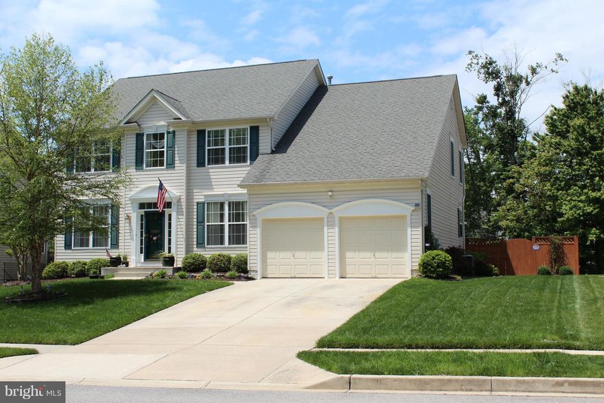 Pack your bags! Dramatic 2 story foyer leads to open floor plan w/tons of natural light. Big kitch w/loads of cabs/counters. Cust. wood blinds thru-out. Hardwood floors-on 1st flr- Huge mstr suite w/his & hers walk-ins & spa-like bath. Fml LR & DR w/wainscoting, Almost 1500 sq ft bmnt w/ rough in bath-ready to finish. Big deck for great BBQ's, large fenced yard & nice landscaping-pet & smoke free!