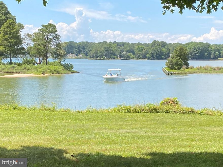 First time offered, this remarkable point of land has a bulging riprapped shoreline with views in multiple directions.  Sunset views.  This Bailey's Neck neighborhood is much sought after, with expensive well-maintained waterfront estates.  Golf, indoor tennis, medical community, court house, museums, restaurants all nearby.  Location is off Rt 333 connecting the County Seat of Easton with the 17th Century seaport  town of Oxford,  Cove is kept dredged to 3 to 4 ft MLW.  Dredged depth continues to dock. House needs a lot of work . Buyer will need to replace the dock, all carpet, kitchen, windows, bathrooms, maybe take out wall between kitchen and family room) but has an excellent floorplan . High land, sandy soil.  Direct TV and Breeze Line are available for tv and internet. Setback line shown on plat was changed to accommodate existing residence. By deeded covenant no short term vacation rentals allowed at Peach Blossom Point.