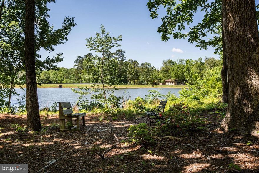 Waterfront, 100 feet of water frontage on beautiful Lake Dover. Oversized, mature 0.54 acre flat lot on Lake Dover in an established neighborhood.  Wake up and enjoy your morning coffee with your serene water view. This vacant lot is ready for you to build your dream home in Lake Land! The activities are endless with the pool, tennis, lake (beach) and rec center, all included in the HOA. The  beach area is located on Lake Land'Or, the largest lake in the community at eighty-seven (87) acres allowing all your water sports such as water skiing. Two ramps are available to launch your boat. If you are in the camping mood, reserve one of the ten camping lots available complete with barbeque pits and areas for campfires. Enjoy the Archery range and Skeet range also located on the Land'Or side. Public water and sewer. Perfect combination for Active person/family. Security Gate at Entrance.