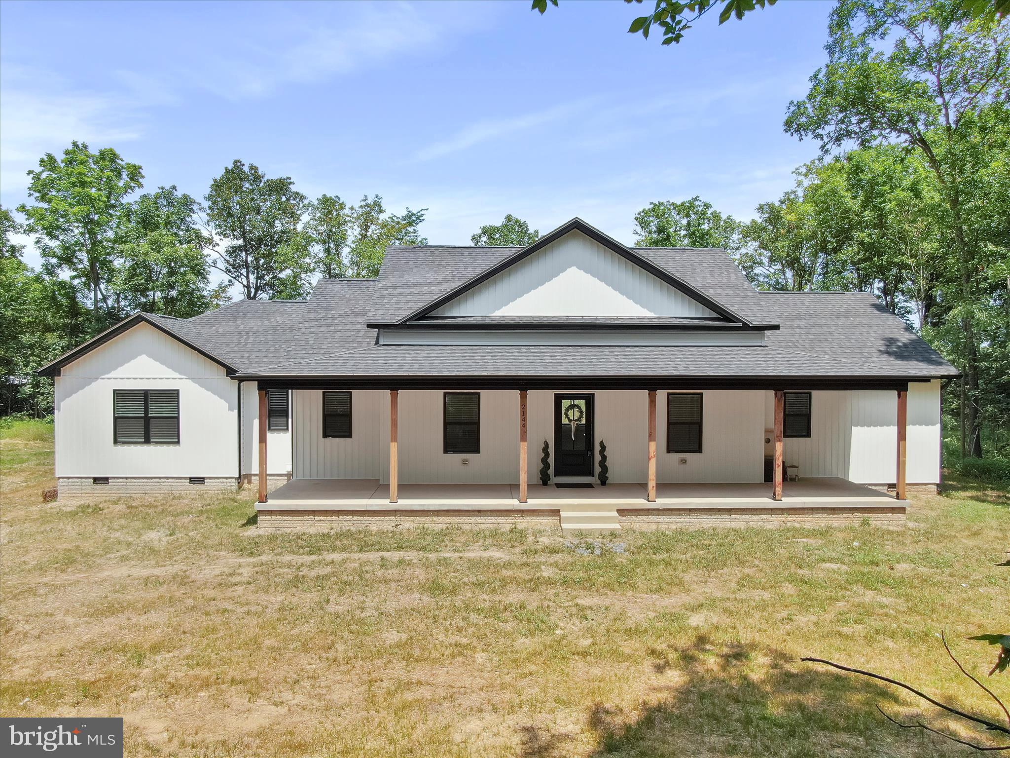 Welcome to this stunning 4-bedroom, 2.5-bathroom home on 1 unrestricted acre in Jefferson County, surrounded by peaceful woods and open farmland—offering the perfect blend of privacy and scenic views. Thoughtfully designed with both comfort and style in mind, this home features luxury vinyl plank flooring throughout and granite countertops in the kitchen and all baths.
The oversized covered porch extends your living space outdoors—ideal for morning coffee, evening relaxation, or hosting guests while enjoying the surroundings.
Inside you'll find a spacious living area with cathedral ceilings, a large panoramic window for taking in nature and a sleek electric wall fireplace that adds a warming touch. The gourmet kitchen is outfitted with black stainless steel appliances, a walk-in pantry with natural light, and an oversized island with plenty of seating perfect for gatherings and everyday functionality. Tray ceilings elevate the style in the primary suite and dining area, adding character and elegance throughout the home.
In addition to the luxury feel, character and practicality this home offers, there's also a dedicated office with built-ins. Laundry is made easier with a large laundry room complete with cabinetry and a soaking sink for added convenience.
Whether you're taking in the peaceful sounds of nature, watching the local farm animals (or your own!) or simply enjoying the freedom of unrestricted land, this home is a perfect escape from the everyday. Schedule your private tour today!