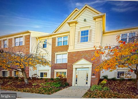 Photo of 1130 Huntmaster Terrace NE #102, LEESBURG, VA 20176 (MLS # VALO2123776)