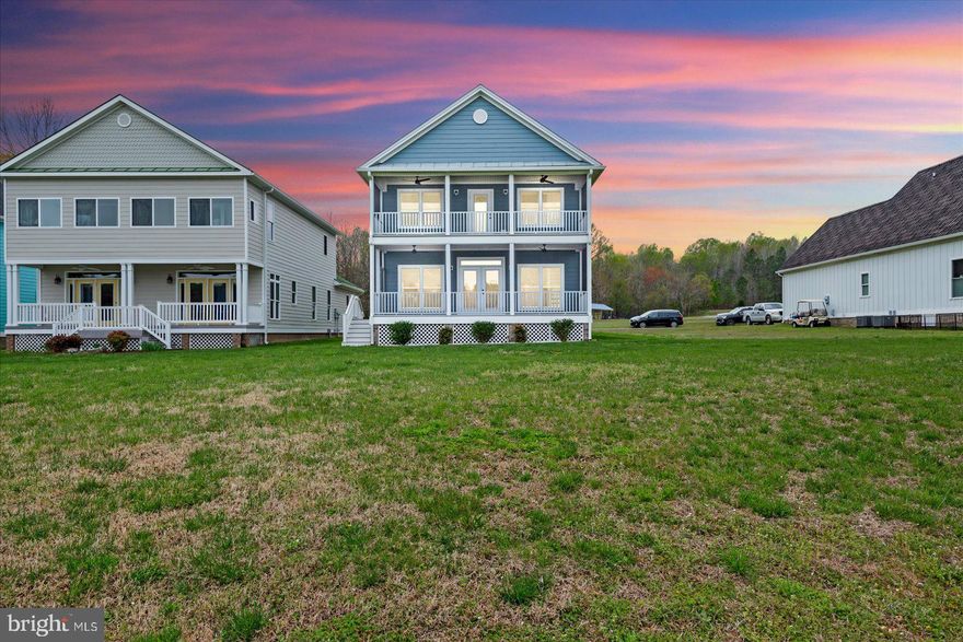 Stunning 4-bedroom, 3.5-bath waterfront retreat in a private, gated community overlooking the serene waters of Totuskey Creek. Nestled in the heart of the Northern Neck, this picturesque escape offers over 2,700 square feet of thoughtfully designed living space with luxurious finishes throughout. Step inside to find exquisite quartz countertops, elegant hardwood flooring throughout, and a modern gourmet kitchen featuring a stainless farmhouse sink, classic subway tile backsplash, and 42-inch cabinetry. The open-concept layout seamlessly connects the kitchen to the main living area, complete with a dedicated dining space—perfect for entertaining or intimate gatherings. Unwind on the double-decker screened-in porches while soaking in the tranquil waterfront views, or retreat to your expansive owner’s suite with a walk-in closet and spa-like en suite featuring a stand-alone soaking tub, dual vanities,  spacious shower and exclusive access to your upper level, screened deck. A second full master suite with a walk-in closet and private bath offers ideal accommodations for multi-generational living or a home office. The upper level also includes two additional bedrooms, a full bath, and a convenient laundry room. High-speed broadband is available, ensuring seamless remote work and entertainment. Embrace the ultimate "Rivah Life" with access to the floating community dock, which includes your deeded deep-water boat slip (18 feet at high tide), offering an easy 8-minute , unimpeded cruise to the Rappahannock River. Additional community amenities include a pool with a covered picnic area and a storage lot for boats and RVs. Ideally located next to the public boat ramp and just four miles from the charming restaurants and shops of Main Street, this home is the perfect blend of luxury, comfort, and waterfront living. Home is also offered for sale with 2.75% Assumable rate.