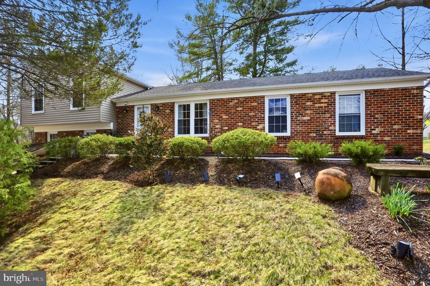 Welcome to 13501 King Charles Drive in Fairfax — a 3-bedroom, 2-bath split-level home set on a corner lot, where comfortable living spaces, thoughtful updates, and inviting outdoor areas come together in a location that keeps you connected to everything Northern Virginia has to offer.

The main level centers around a bright kitchen featuring white cabinetry and stainless steel appliances, creating a welcoming space for everyday meals and conversation. Just beyond, the living and dining areas connect naturally, allowing the home to feel open while still maintaining defined spaces for gathering and daily routines.

Upstairs, the primary bedroom offers a quiet retreat with its own private en-suite bath. Two additional bedrooms are located along the hall and share a full bath. One of the secondary bedrooms has been thoughtfully converted into a wardrobe space, offering generous storage while still allowing the room to easily return to a traditional bedroom if desired.

The lower level adds valuable living space with a comfortable recreation room, laundry area, and a large mudroom with a pantry space that helps keep daily life organized — especially during busy mornings or coming and going throughout the day.

Outdoor living continues with a spacious deck and patio that create a natural extension of the home, offering plenty of room for grilling, gathering with friends, or simply enjoying time outside. A generously sized shed — the largest permitted within the community — provides excellent additional storage, while the driveway and two-car garage offer ample parking. The HVAC system and the appliances were replaced approximately 2 years ago providing added peace of mind.

Situated in Fairfax with convenient access to nearby parks, shopping, and dining, the home also provides easy connections to major commuter routes including Route 50, Route 28, I-66, and the Dulles Toll Road, offering access to Reston, Tysons, Dulles Airport, and Washington, DC. The property is located within the Lees Corner Elementary, Franklin Middle, and Chantilly High School pyramid, while nearby Montessori programs — including Montessori School of Chantilly and Guidepost Montessori — offer additional early learning options throughout the Chantilly and South Riding area.

13501 King Charles Drive offers a comfortable balance of interior living space, outdoor enjoyment, and a location that keeps everyday conveniences close at hand.