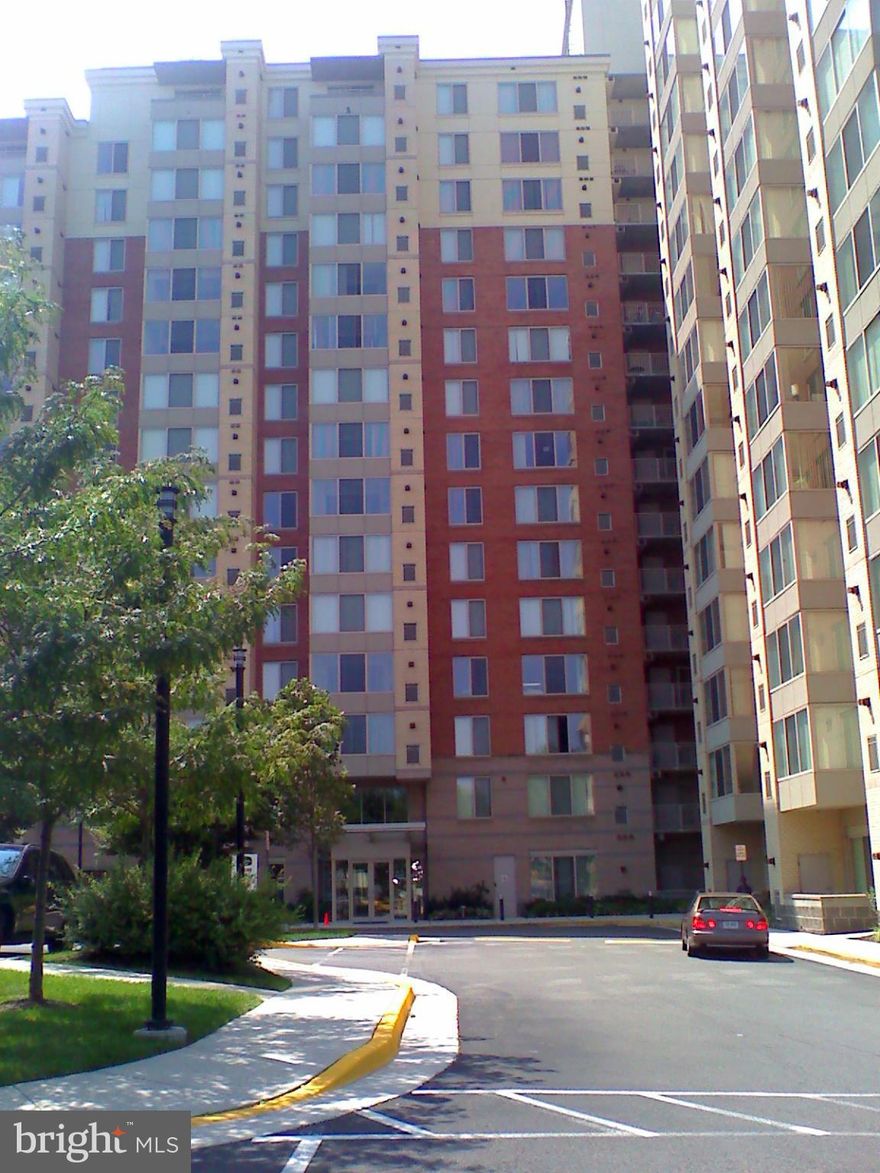 Spacious and light-filled 2BR, 2BA condo, walk-in closets in bedrooms, kitchen with granite countertops, balcony, hardwood floors. Great location, next to Mosaic center, across from Dunn Loring metro, close to 495 and 50. 2 assigned garage parking. Club room, gym, rooftop pool and business center. Must see!