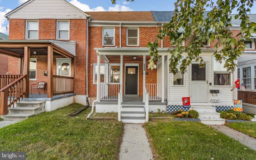 THIS IS THE ONE YOU'VE BEEN WAITING FOR! Recently renovated three-level townhouse is situated in the heart of Dundalk. The main level features an open-concept design encompassing a spacious living room and a well-appointed kitchen with high-quality stainless steel appliances - complete with a beautiful island/breakfast bar. There are two spacious bedrooms upstairs, along with a full bathroom that boasts modern amenities, including an LED bathroom mirror with integrated lighting and an anti-fog feature - there's even a skylight in the bathroom, offering natural illumination!Throughout this beautiful home, you'll find upgraded lighting fixtures, and stunning design features. The basement offers potential for a third bedroom, and it boasts an electric fireplace, creating a cozy and inviting family room. Additionally, you'll find a convenient half bathroom and a walk-up backdoor exit off the laundry room. Outside, the property boasts a charming covered front porch and  one dedicated parking space in the rear, to go along with abundant street parking. Furthermore, this prime location provides unlimited dining, shopping centers and grocery stores just minutes away!  WELCOME HOME!!