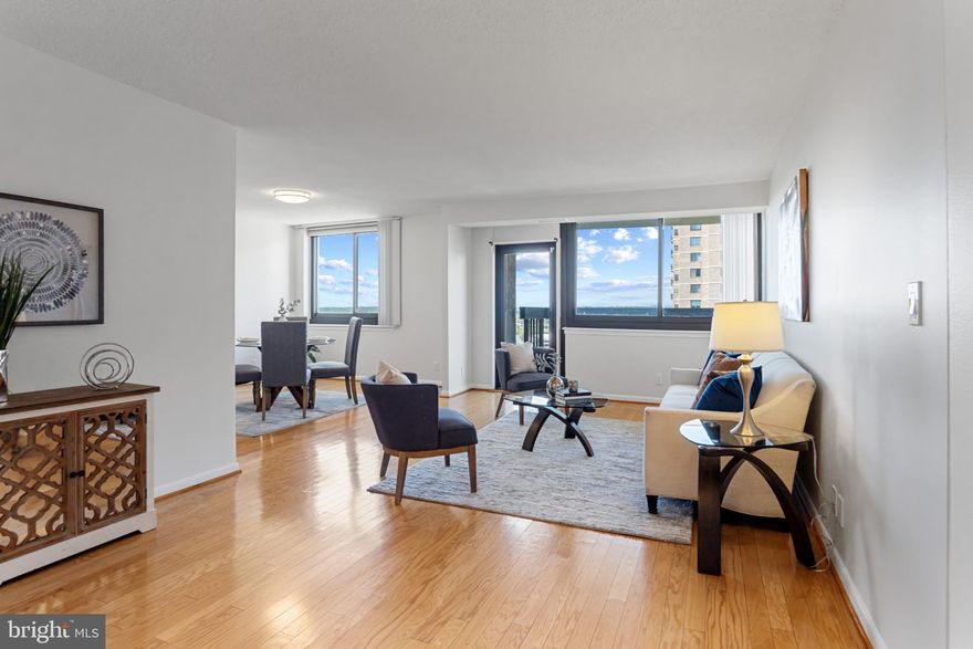 2 Beds | 2 Baths | 1,329 Sq Ft | Garage Parking + Storage
Welcome to Skyline Square Condominiums, where two meticulously maintained buildings meet to offer accessibility, serenity, and luxury. This Calvert model is in a premium location, perched on the 20th floor of one of Northern Virginia’s tallest residential towers. To describe this property as spacious would be an understatement, as it offers 1,329 square ft. of premium living space and tons of closets and storage. Sweeping panoramic views of the DC skyline, Air Force Memorial, and Tysons Corner—are all attained by stepping onto your private nest in the sky, the large private balcony. With nothing but open sky between you and the horizon, your morning coffee just got a serious upgrade.

Inside, experience affordable luxury at its finest. Real hardwood floors flow through the main living areas, while plush, high-end carpet adds warmth to both bedrooms. Natural light pours in through large, recently replaced energy-efficient windows, giving every space an airy, open feel. The renovated kitchen features sleek new cabinetry, Calacatta Idillio quartz countertops, and stainless steel appliances. Both bathrooms are fully updated with modern ceramic tile flooring, new lighting, and designer finishes. Let the laundry pile up—when you're ready, your large-capacity side-by-side washer and dryer are right there in your laundry closet with built in cabinetry ready to handle it with ease!

Freshly painted from top to bottom—including closets, ceilings, and trim—in a soft, versatile neutral color, this home is truly move-in ready.

At Skyline Square, residents enjoy resort-style amenities including a pool, fitness centers, steam and sauna rooms, billiards, pingpong, a party room, car wash, electric vehicle charging, garage parking, and private storage. With a Walk Score of 70, dining, shopping, and daily essentials are just steps from your front door.

Located on the edge of Falls Church, Alexandria, Shirlington, and N. Arlington Skyline Square was envisioned by developer Charles E. Smith as a “total living environment”—and it still delivers. You’ll be just 9 miles from the heart of D.C., and minutes to Amazon HQ2, Pentagon City, the AlexWest redevelopment with Harris Teeter, the Landmark Mall Redevelopment, Trader Joe's, The Fresh Market, Giant, and key commuter routes like I-395, I-495, and Reagan National Airport.

This is luxury, location, and a carefree lifestyle—all wrapped up in one spectacular view.