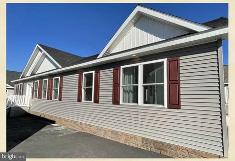 Photo of 482 Manatawny Street, POTTSTOWN, PA 19464 (MLS # PAMC2195982)