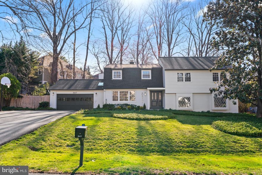 Welcome to 8417 Kingsgate Road, an extraordinary residence nestled on a quiet street in the heart of Potomac. Thoughtfully reimagined with a designer’s eye and an emphasis on form and function, this home offers over 5,000 square feet of beautifully refined living space across four levels, all set on a serene and private lot. Every inch of this home has been elevated with curated updates that blend warmth, sophistication, and livability. The renovation includes a new roof, new windows, new wide-plank 9-inch luxury vinyl plank flooring, and all-new light fixtures throughout. The stunning kitchen is a true centerpiece, anchored by a quartz countertop that seamlessly continues up the backsplash and into the custom hood surround, giving the space a striking and cohesive aesthetic. Top-of-the-line Miele appliances and sleek cabinetry bring both function and flair to this gourmet kitchen. Bathrooms have been fully renovated with Porcelanosa tiles, modern fixtures, a new faucet collection, and spa-like finishes. Soft wood accents, thoughtfully incorporated across the home, tie the living spaces together with quiet luxury. On the main level, enjoy effortless entertaining in the expansive formal living room, while the cozy family room invites intimate gatherings around the fireplace. Just beyond, double doors open into an enclosed sunroom with walls of windows that frame the lush backyard, leading to a brand new composite deck, ideal for outdoor dining or peaceful morning coffee. Upstairs, the primary suite is a sanctuary in every sense. A private retreat off the bedroom functions beautifully as an art studio, home office, observatory, or reading nook, with wood-paneled ceilings and tranquil views of mature trees. The suite is complete with massive walk-in closets and an indulgent ensuite bathroom with a soaking tub, oversized shower, and dual vanities. The top level offers a rare bonus, a generous flex space perfect for a playroom, creative studio, or additional lounge area. On the lower level, a fully finished basement includes a recreation and brand-new media room, a home gym, and an abundance of storage. Outside, the exterior has been painted and modernized for exceptional curb appeal. The backyard has been professionally cleared and landscaped, creating a peaceful, usable oasis with space for relaxation and play. All of this is located within one of Montgomery County’s most desirable school clusters, and just minutes from Potomac Village, the River Falls Swim and Tennis/Pickleball Club, and the expansive trails of Great Falls National Park. Enjoy easy access to Clara Barton Parkway, I-495, and a variety of shops, dining, and outdoor destinations that define the Potomac lifestyle. This is more than a home. It is a complete living experience where timeless design meets everyday comfort. Come see what makes 8417 Kingsgate Road so truly special.