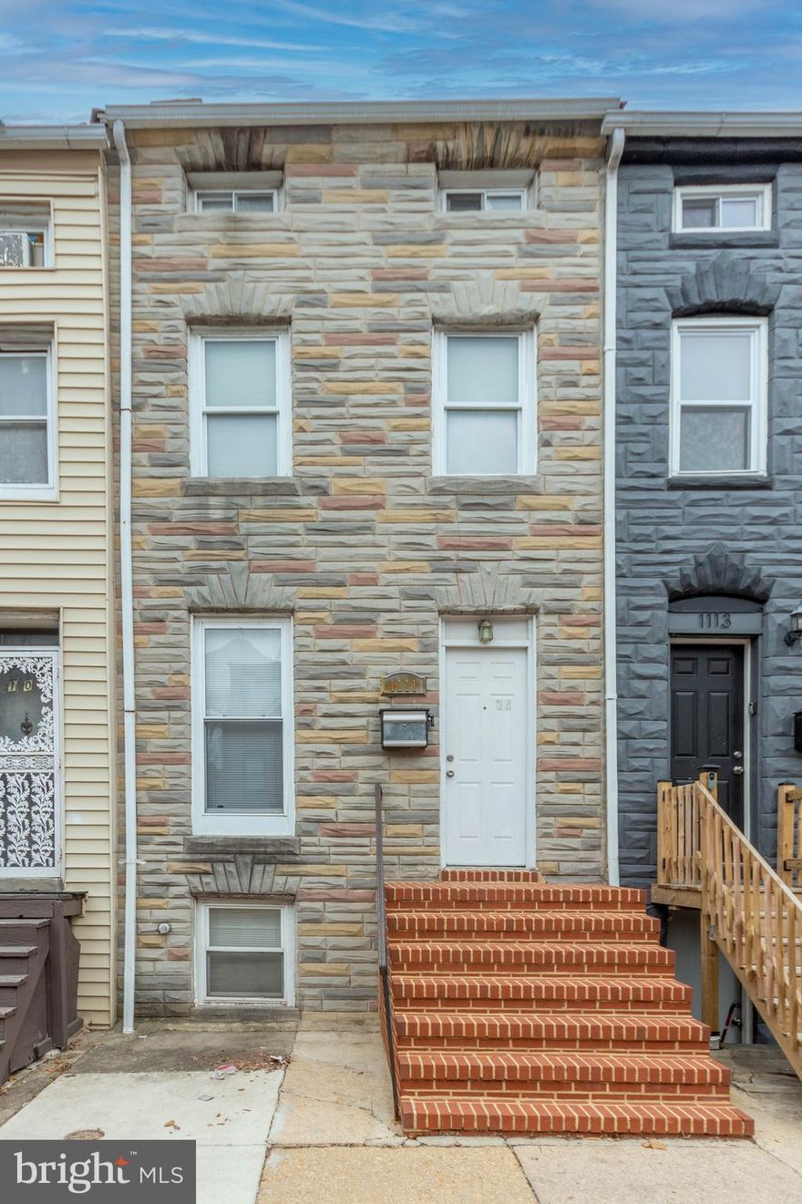 List price to be opening bid at online only auction.  Online auction to be conducted on Auctioneers website. Bidding Wednesday, April 2 & ends Monday, April 7, 2025, at 11:30AM. This charming 2.5-story townhouse with a basement is located in the desirable "Hollins Market" neighborhood of Baltimore City. The home offers 3 bedrooms and 1 full bath. The backyard is fenced-in; and can be accessed from a walkout in the lower level and a walk-down from the small porch off the back of the house. The main level features an open floor plan with a living area, dining area, and kitchen. The second level includes 1 bedroom and a full bath. The third level has 2 bedrooms. The lower level is partially finished and houses the home’s mechanical systems and laundry area. This property is currently occupied but will be vacant at settlement, providing the new owner with the opportunity to renovate and flip or use it as a rental property. Conveniently located just north of Washington Village (Pigtown), this home is close to downtown Baltimore and offers easy access to Horseshoe Casino, M&T Bank Ravens Stadium, Oriole Park, CFG Bank Arena, as well as a variety of restaurants, hospitals, Union Park, Carroll Park, and more.