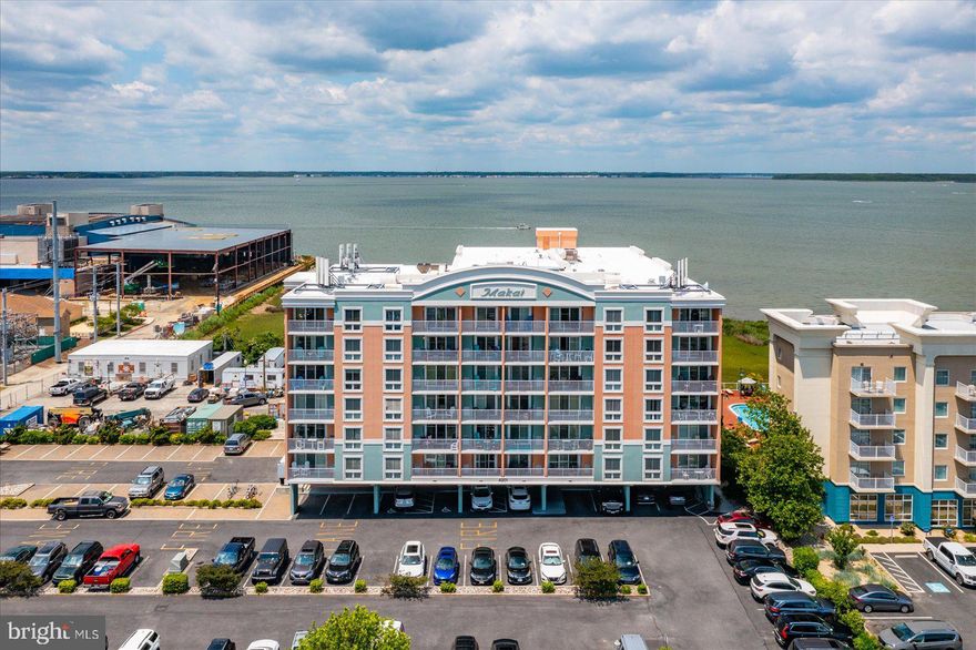 Welcome to the Makai!  This complex has all of the amenities you could dream of and is just across the street from Atlantic Ocean and next door to the Ocean City Convention Center.  What a great spot in mid-town Ocean City!  Let's start with the heated indoor pool that transforms to an outdoor pool during the Summer.  Glass garage doors open this area to outdoor patios with stunning bay views!  When you are done swimming head to the billiards room to compete against friends and family.  If you're not in the mood for a game of pool, relax in the Sauna or challenge yourself in the state-of-the-art fitness center.  Maybe poker is your game of choice and if that is the case you are in luck as the large lobby features two poker tables.  Directly off of the lobby is a bike storage room.  The entire complex is secure access and has on-site management.  After being overwhelmed by the abundance of high end amenities it is time to check out the condo itself.  This studio apartment features a kitchen and bath with granite countertops, ceramic tile flooring throughout, and crown molding that accents the ceilings.  Move outside on your private balcony with view across the street of the Atlantic Ocean.  Look left to Right and see the panoramic city view.  This condo is being sold fully furnished!  With a location that can't be beat and amenities galore this is the condo you have been waiting for to make the beach lifestyle a reality for you!  Additional beach storage locker included with condo located in the 4th floor storage room.  Direct TV fee of $151 per quarter in addition to condo fee of $534/Quarter.  Buyer responsible for one-time $75 transfer fee at settlement.