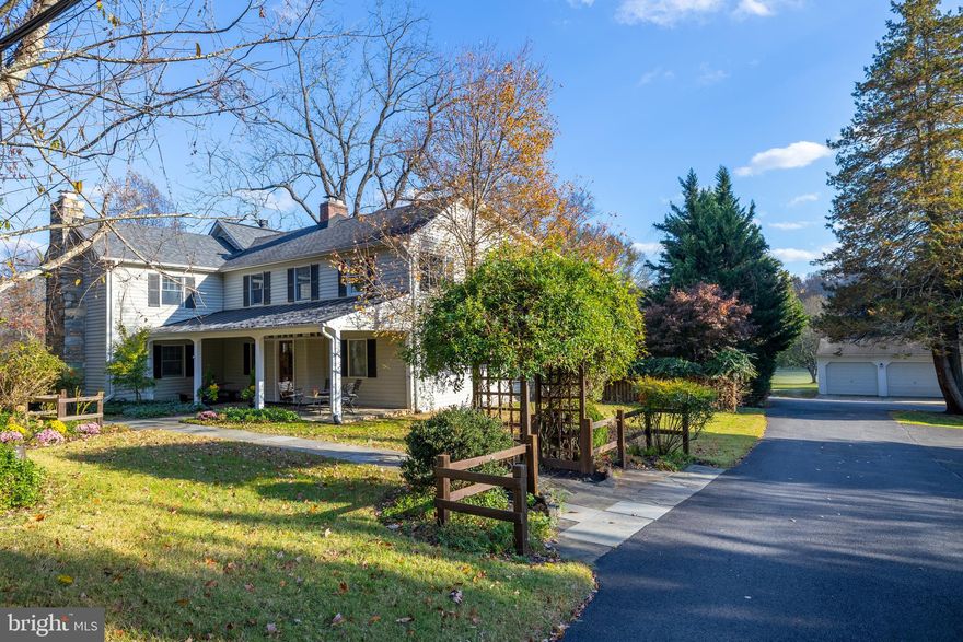 ***Sunday Open House Canceled***Rarely available Oakton farmhouse sited on one acre of wonderfully flat useable yard. This home features four bedrooms, three and a half baths and an extra large three car detached garage.  If you are looking for a home that affords entertaining both inside and out, this is the home for you. With the charm of a farmhouse and the convenience of open concept living, you will love the kitchen, dining area, family room, and sitting area all looking out over the expansive back yard. The home has hardwood floors throughout the main level, all wood six panel doors throughout, and built-in shelving.  The kitchen has honed black granite countertops and stainless steel appliances. There are several fireplaces for cozying up to in the winter. Upstairs you will find a light-filled primary suite with two large walk-in closets and beautiful en-suite bathroom. Three additional bedrooms, two large full bathrooms, and upstairs laundry room round out the upper level. Outside you will be greeted by a massive flagstone and brick patio with stone firepit. The flat backyard is perfect for outdoor fun. The detached garage boasts three large bays and one bay is insulated with a heat/ac unit for use as a gym, workshop, or office. Updates: 2025: New Paint in Bedroom One. New Ceiling Fans in Bedroom Two and Three. 2024 - Upstairs Hall  Bath Renovation - New Tub, Shower Tile, Faucet, Shower Head, and Pedestal Sink. New Shower Plumbing and Drain Line. New Paint in Bathroom.  New Water Filtration Tank. New Carpet in Primary Bedroom. 2023 - New Hot Water Heater, New Water Pressure Tank, Garage Fascia Trim wrapped with Aluminum. 2022- Septic Drain Field re-laid with New Piping and Concrete Distribution Box. Septic Tank Pumped. New Section of Paved Driveway Added. 2021 - New LG Washer/Dryer Unit. 2020 - Basement Waterproofing with interior drainage system running to new sump pump.  New Bathroom Faucets.  2014 - Heat pump replaced to original part of the home. 2012 - Major addition/renovation including new siding and roof, and  separate heat pump zone. New Well Pump. ****Agent Owned****