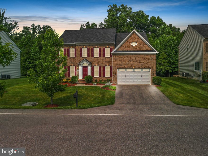 Welcome to 716 Ardonia Terrace, Upper Marlboro! This stunning three-story colonial home in the prestigious Oak Creek Club offers a luxurious and comfortable living experience. 
Step inside the grand entrance of this home, where you'll be greeted by the impressive two-story foyer, setting the tone for elegance and sophistication. The attention to detail is evident with crown molding, columns, and wainscoting throughout, adding a touch of architectural charm to every corner.
With two staircases and hardwood floors flowing seamlessly, this home offers both style and convenience. The main level boasts a formal dining room and a spacious living room, perfect for hosting gatherings and creating lasting memories.
Prepare culinary delights in the gourmet eat-in kitchen, complete with stainless steel appliances, a gas cook-top, breakfast bar, and a convenient island. The adjacent breakfast room is an ideal spot to savor your morning coffee while enjoying the serene views.
The heart of the home lies in the impressive two-story great room, featuring a cozy gas fireplace, providing warmth and ambiance during colder months. Need a quiet space to work? Look no further than the office, providing a tranquil atmosphere for productivity.
Retreat to the expansive primary suite, which offers two walk-in closets, a comfortable sitting area, and an attached primary bath, creating a private oasis for relaxation and rejuvenation. The upper level also includes three additional well-appointed bedrooms and two full baths, providing ample space for family and guests.
The lower level of this home offers endless entertainment possibilities. Unwind in the inviting family room or enjoy friendly competition in the spacious rec room, complete with a wet bar. Additionally, the fifth bedroom features an attached Jack and Jill bathroom, providing convenience and privacy.
Living in Oak Creek Club, you'll have access to a variety of fantastic amenities, including a championship golf course, swimming pools, tennis courts, and walking trails. The community also offers a clubhouse, fitness center, and playgrounds, ensuring there's always something to enjoy right at your doorstep.
This home offers easy access to a range of area attractions, including shopping centers, restaurants, and parks. Commuting is a breeze with convenient access to major highways, such as I-495 and MD-4, making it easy to reach downtown Washington, D.C. and surrounding areas.
Don't miss the opportunity to own this exceptional three-story colonial in Oak Creek Club. Schedule your private tour today and experience the epitome of luxury living.