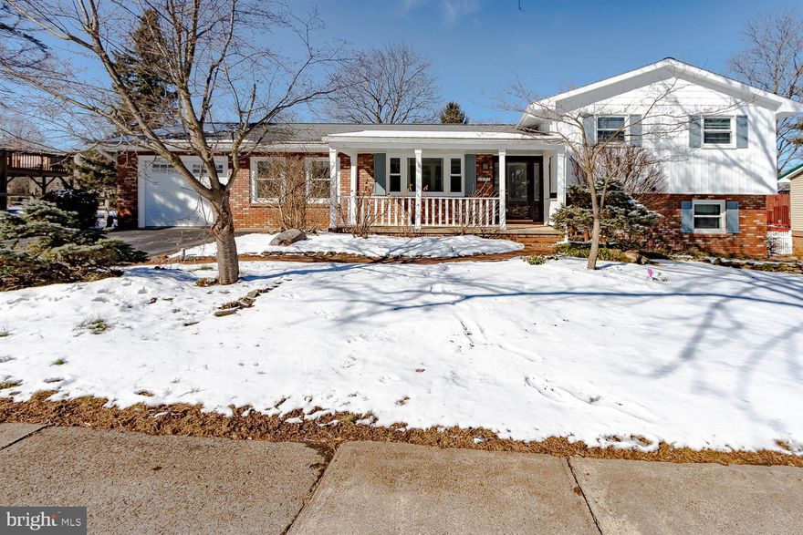 OPEN HOUSE - Thursday, February 26th, 4:30 - 6:00 PM.  Nestled on a tree-lined street in the heart of the desirable Greentree neighborhood, this charming borough home is deceptively spacious. Inside, the main level is full of natural light, highlighting cherry hardwoods in the living and dining areas. The kitchen features granite countertops and a cozy eat-in nook that overlooks the private backyard. Organization is a breeze thanks to the thoughtful mudroom featuring custom built-ins—the perfect "drop zone" for busy days.

Upstairs, you'll find a primary bedroom with an en suite bathroom plus three additional bedrooms. The walkout lower level was renovated last year and is a light-filled space boasting new LVP flooring, recessed lighting, an office, and a full bathroom/laundry combo.

Situated on one of the larger lots in the neighborhood, the backyard is wonderfully private. Enjoy the covered composite deck, garden to your heart's content, or explore the "cute as a button" playhouse. The additional outbuilding with a loft is a dream for hobbyists, offering space for a workshop, studio, or ample storage. Updates provide peace of mind, including newer windows, fresh exterior paint, newer gutters, and custom built-ins.

You are just steps away from Orchard Park and the community bike path for evening strolls. Enjoy the small-town lifestyle with close proximity to Corl Street Elementary, State High, Welch Pool, and downtown. With easy access to bus stops and a quick commute to the PSU campus, you're tucked away in a peaceful neighborhood while remaining close to everything you love. Welcome Home!