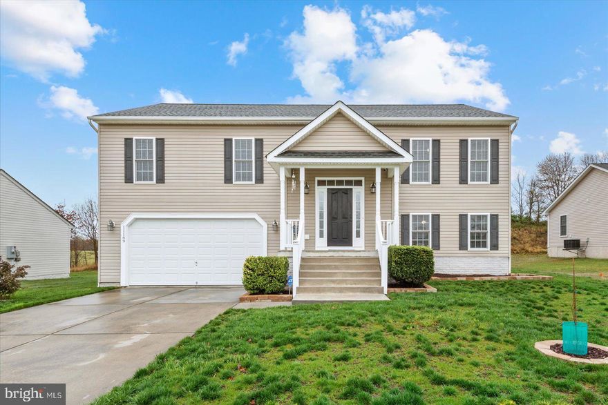 Price Reduced. Absolutely immaculate and move in ready home that owners have taken pride in.  TOTAL SQUARE LIVING SPACE IS 2228. Oversized, heated deep garage that can fit up to 4 cars (700 Sq. Ft).  Walk inside and you will be amazed. All of the room sizes are very spacious. Kitchen is bright and sunny with nice counters, lots of cabinet space and plenty of room for your kitchen table.  Separate formal dining room for all your entertaining needs. Large master suite has it's own private master bathroom and 2 other nice size bedrooms with a full bath in between. Downstairs is another full bath, large family room , office/exercise room or use it for storage.  Good size deck off the kitchen that is great for the summer cook outs to come. Rear yard is fenced and backs to farmland. Unique property in this nice community that you do not want to miss out on.