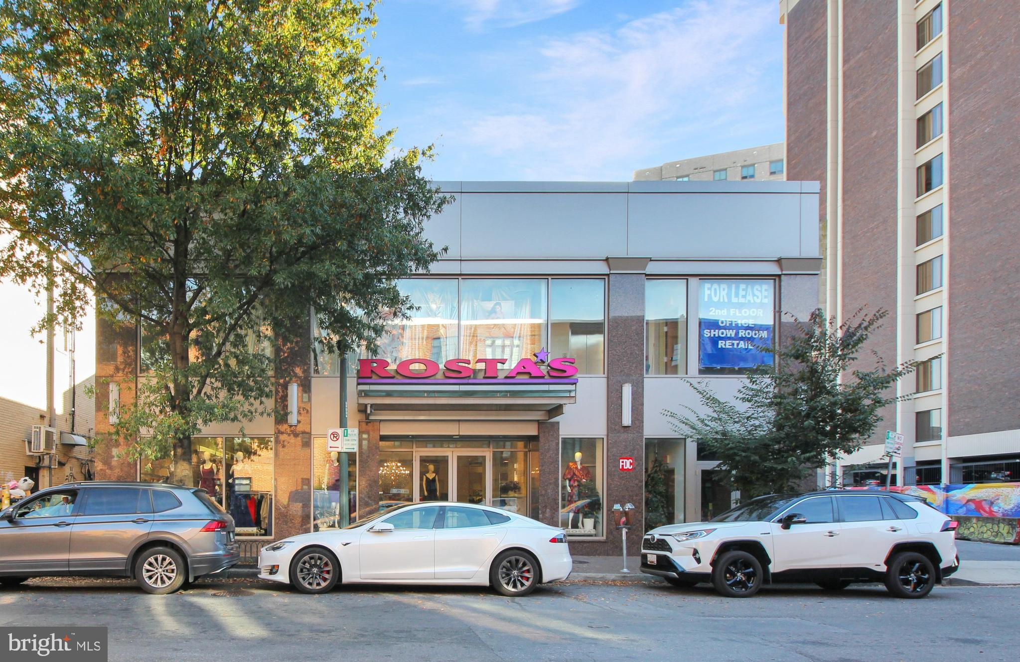This exceptional 5,900 sq. ft. commercial property in the heart of Downtown Silver Spring offers a prime opportunity for business owners seeking a modern and versatile space. Built in 2010 and currently operating as a retail clothing store, the building features two expansive levels designed to accommodate a variety of uses. The main floor provides an open layout, perfect for showcasing products in a high-traffic area, while the lower level, accessible via a stunning oversized staircase, is ideal for retail, showroom, or creative space. Additionally, the upper level of the building is available for lease, providing even more flexibility for office or other business needs. Located near the Metro, this property ensures convenient access for customers and employees. With its flexible design and prime location, this dynamic space is ready to take your business to the next level. Adjacent to 700 parking space garage coming soon. Schedule a private tour today and see how this prime property can elevate your business!!!