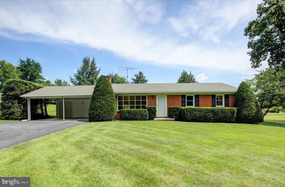MOVE IN READY Brick Rancher w/good curb appeal on a private, flat .66 acre lot. This ONE OWNER home has been well maintained w/many recent updates including refinished hard wood floors, LVT floors in Kit/DA, new paint throughout, new oversize baseboard, and other updates over the years such as replacement windows, water heater (2022), 200 AMP elec. service, ceramic tile floor in bath and washer/dryer moved to main level in mudroom. Whether you are enjoying your coffee or a cold ice tea sitting under the 2 car carport or on the back patio, you will feel relaxed and at home! You will just experience a good feeling whether you are inside or outside and you will want to call this "HOME".