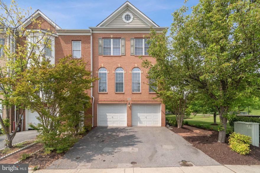 This stunning former model, end of group townhouse, is located in the sought after Montjoy community built by Winchester Homes!    The main level features a spacious family room with wet bar, recently renovated full bath (2020) and a office/bedroom.  The gourmet kitchen is designed to be the heart of the home, which opens to the sunroom and dining room.  The kitchen is complete with a generous pantry, stainless steel appliances, granite countertops, gas burning fireplace and newer gleaming hardwood floors.    The formal dining room and living room feature newer hardwood floors and a elegant  coffered ceiling with built in surround sound.  The upper level is comprised of a beautiful primary suite with gleaming hardwood floors, custom walk in closet and luxury bathroom.  Two additional, spacious bedrooms and renovated (2020) hall bath completed this level.   An oversized two car garage, composite deck and patio are a few additional features one must have!   Do not  miss this one!