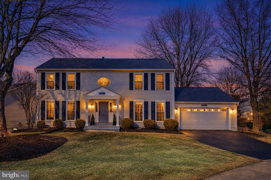 Welcome Home to Your Private Retreat in Centre Ridge. Nestled on a quiet cul-de-sac in the highly desirable Centre Ridge community, this stunning Harrington model offers the perfect blend of timeless elegance, modern updates, and resort-style living. Fully renovated from top to bottom, this exceptional Colonial features 4 bedrooms, 3.5 bathrooms, and over 3,500 finished square feet on a generous 0.28-acre lot complete with a private backyard oasis. A freshly painted exterior, brand-new shutters, inviting front porch, and sleek new garage door create outstanding curb appeal, while major upgrades including a new roof (2022), premium gutter guards, and state-of-the-art triple-pane, anti-glare, sound-reducing windows enhance both comfort and efficiency. Step inside to a breathtaking two-story foyer filled with natural light and gleaming hardwood floors throughout the main level, complemented by fresh neutral paint that creates a warm and inviting atmosphere. The fully remodeled chef’s kitchen serves as the heart of the home, showcasing over $100,000 in upgrades including Level 3 custom cream cabinetry, Solaris granite countertops, designer backsplash, oversized center island, floor-to-ceiling storage, and a built-in bar area with beverage refrigerator—perfect for entertaining. The adjacent dining area opens to an expansive deck through a new sliding door with plantation shutters, seamlessly extending indoor-outdoor living, while the fully fenced backyard provides privacy and space to relax or entertain. The kitchen flows effortlessly into the inviting family room featuring custom built-ins and a cozy fireplace convertible between gas and wood-burning. Double French doors lead to the formal living room, and the formal dining room features stylish shiplap accents and modern lighting ideal for gatherings and celebrations. Upstairs, four generously sized bedrooms and two beautifully updated bathrooms provide comfortable accommodations, including new carpeting in three bedrooms and along the staircase. The primary suite offers cathedral ceilings, updated lighting, new carpeting, a spacious walk-in closet, and a spa-inspired en-suite bath remodeled in 2022 with soaking tub, glass-enclosed shower, designer tile, and double vanity, while the updated hall bath includes a jetted tub. The fully finished walkout basement expands living space with LVP flooring, fresh paint, an updated full bathroom, large recreation area, and a versatile den or office that may serve as a fifth bedroom (no window). A new sliding glass door leads to a covered patio, providing year-round outdoor enjoyment. Designed with comfort and wellness in mind, the home includes a new HVAC system (2022) with surge protection, humidifier, UV light, and advanced air purification system, along with a new hot water heater (2023). The oversized EV-ready garage features a professionally installed 220V electric vehicle charging outlet, and upgraded mesh gutter protection enhances long-term maintenance. Residents of Centre Ridge enjoy premium community amenities including a clubhouse, pool, fitness center, racquetball, tennis, and pickleball courts, all conveniently located near shopping centers, library, movie theater, neighborhood elementary school, and major commuter routes including I-66, Route 28, and Route 29. This rare turnkey opportunity perfectly blends luxury, flexibility, and tranquility in one of Northern Virginia’s most sought-after communities—experience resort-style living in the heart of Centreville and schedule your private tour today.